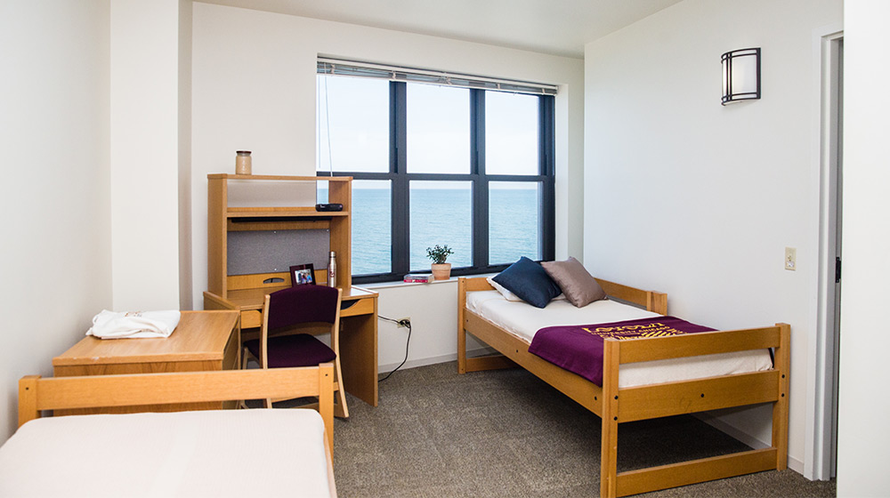 An empty dorm room at Loyola University Chicago Santa Clara Hall