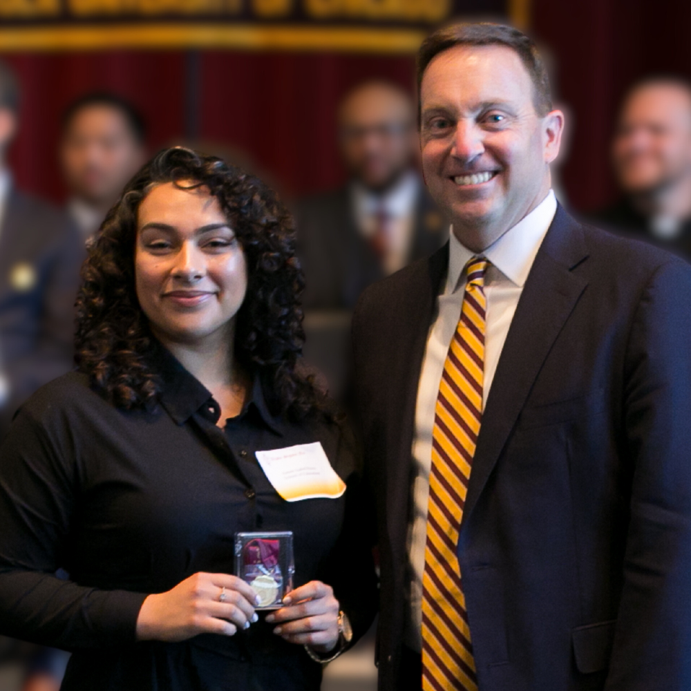 Loyola Chicago student Aimee Peres is inducted into Alpha Sigma Nu.