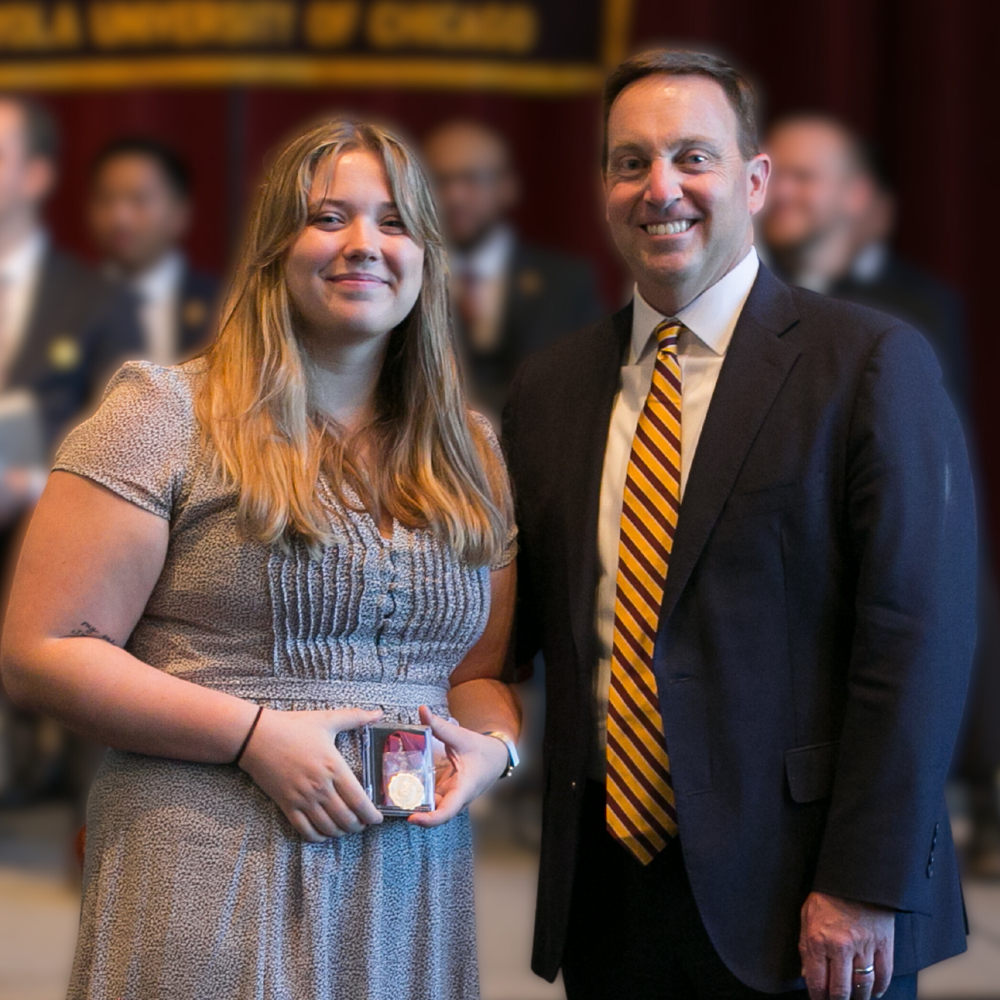 Loyola Chicago student Elizabeth Breman is inducted into Alpha Sigma Nu.