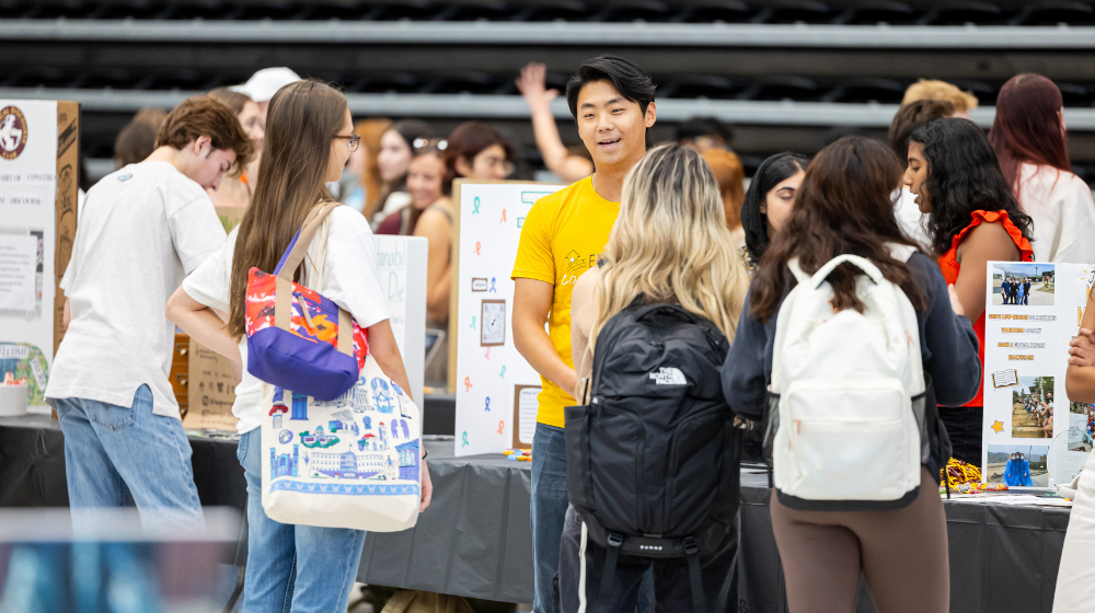 Students learn about student organizations at the Org Fair.