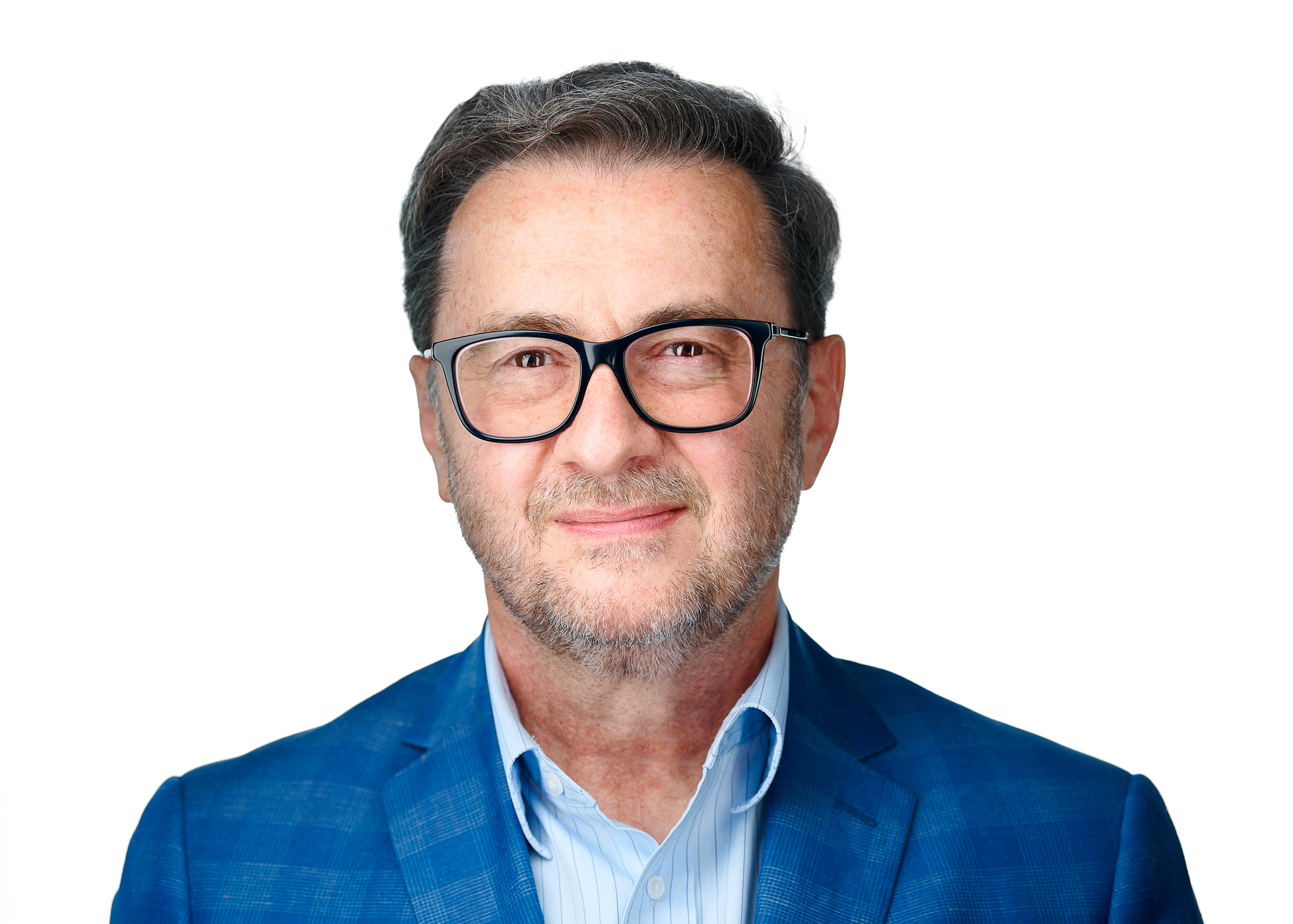 A person wearing glasses against a white background